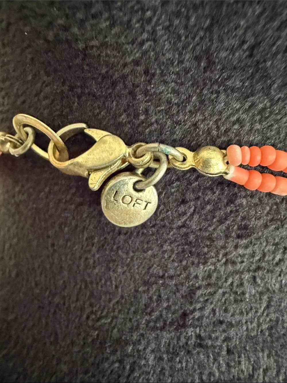 Loft long double strand necklace w/ coral seed beads and gold tone disc clusters